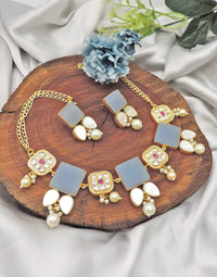 Colette Earrings and Necklacefrom Dori