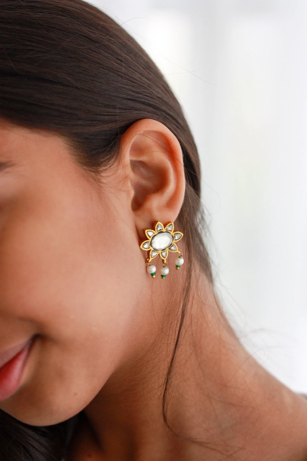 floral Motif Kundan earringsfrom Dori